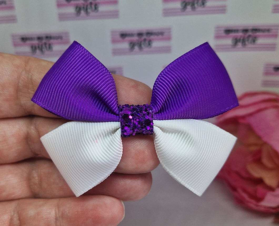 Purple and white ribbon bow