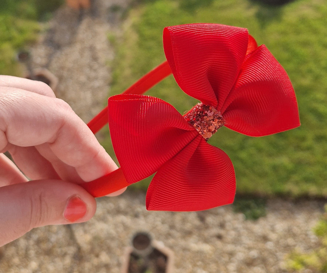 Red ribbon bow headband