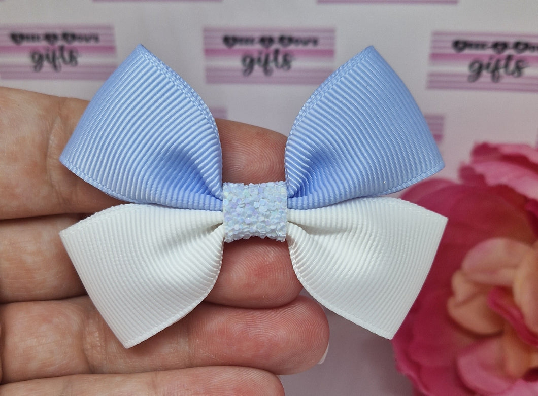 Light blue and white ribbon bow