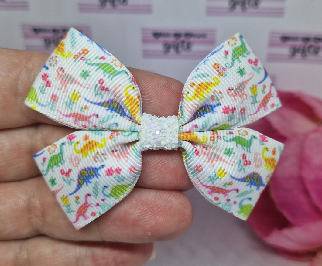 Small pastel rainbow dinos ribbon bow