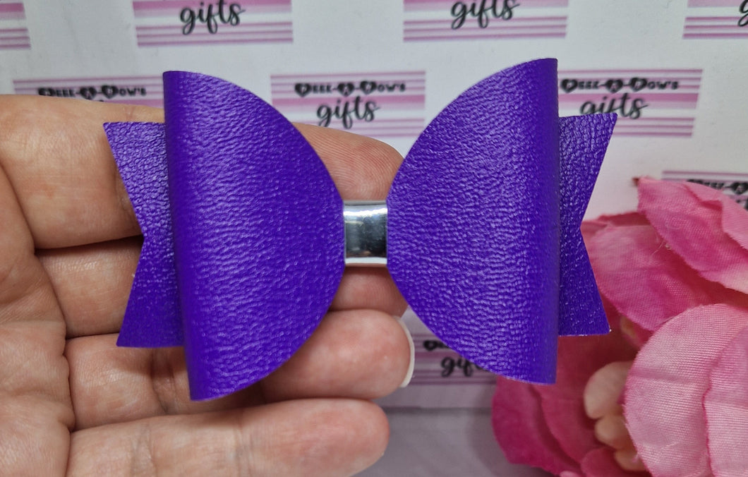 Purple leatherette bow