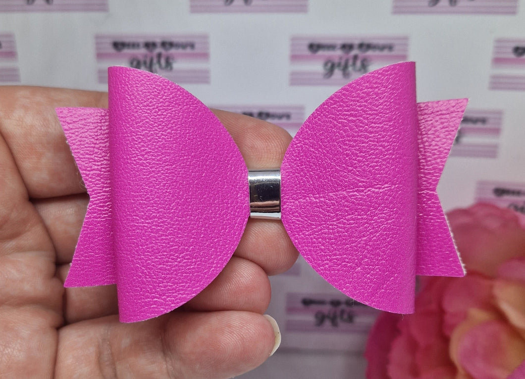 Barbie pink leatherette bow