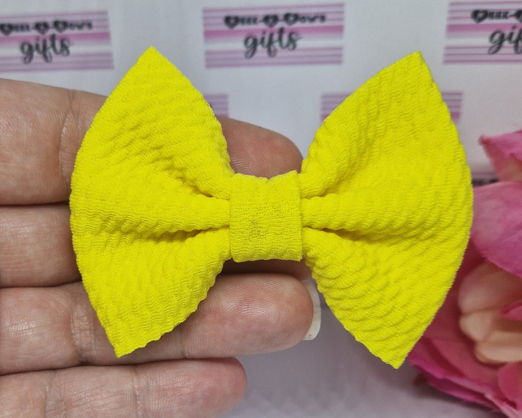 Neon yellow bullet bow