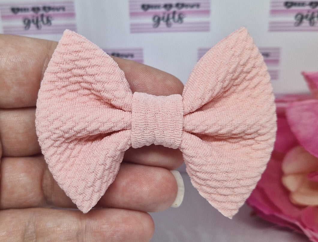 Baby pink bullet bow