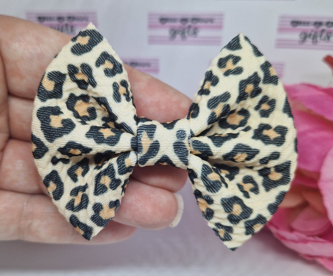 Nude leopard bullet bow