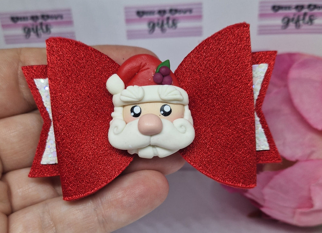 Santa face clay bow