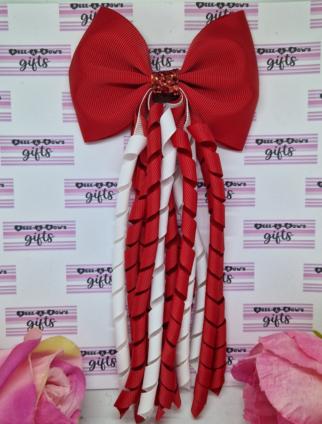 Red and white korker bow