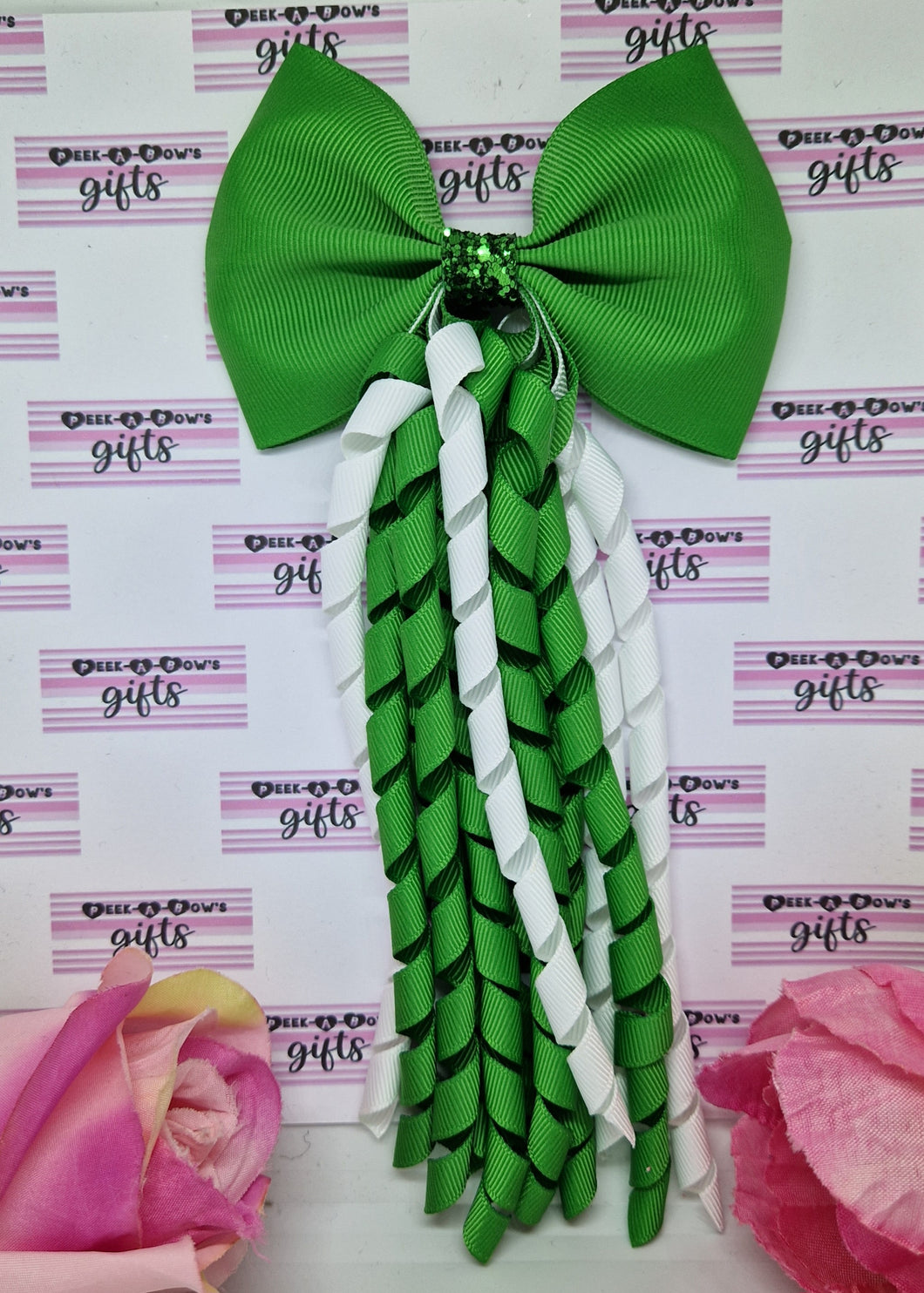 Green and white korker bow