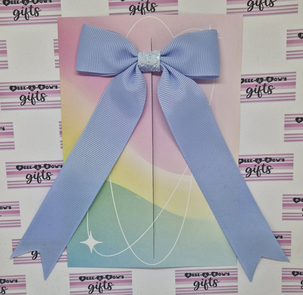 Small light blue long tails ribbon bow