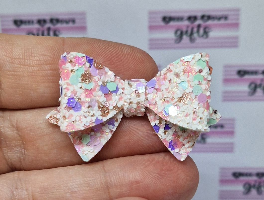 Tiny sandy party bow