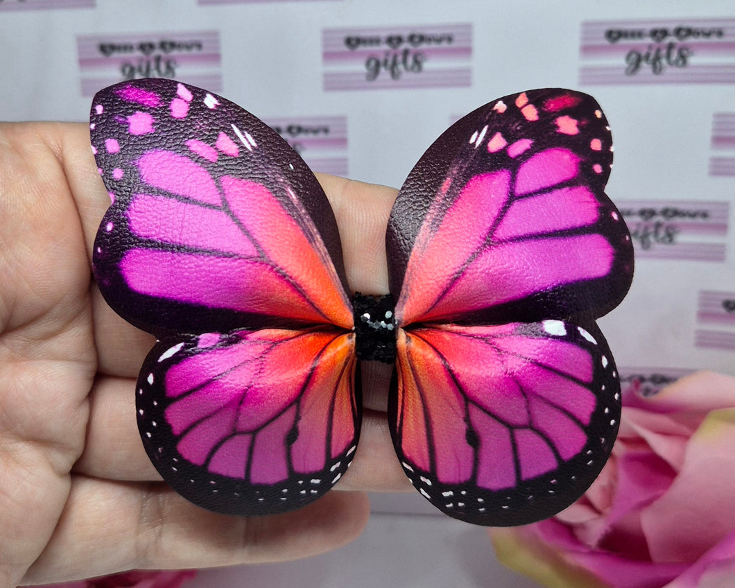 Pink/orange pinch butterfly bow