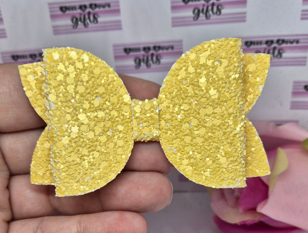 Yellow glitter bow