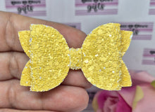 Load image into Gallery viewer, Yellow glitter bow
