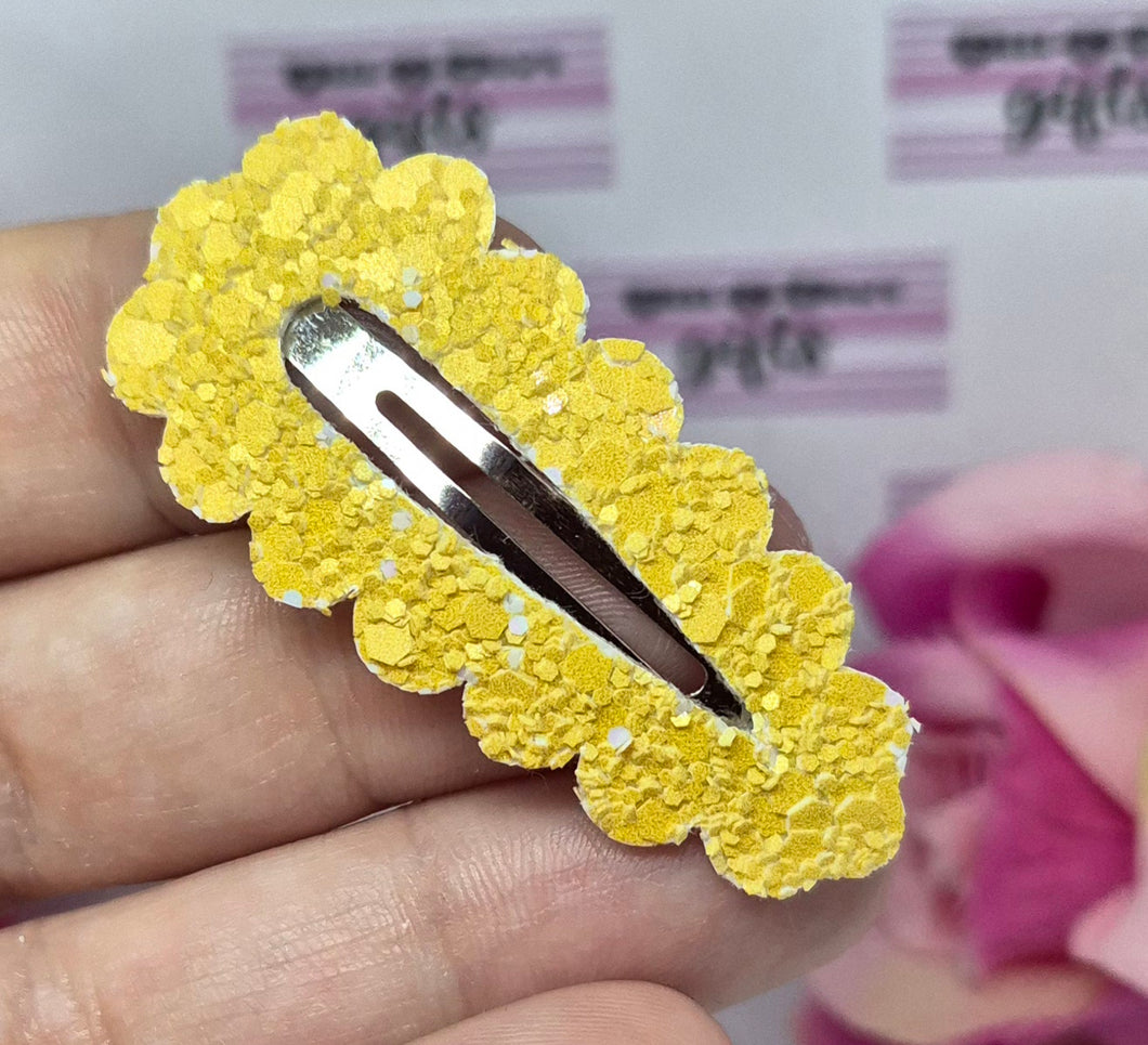 Darker yellow glitter snap clip