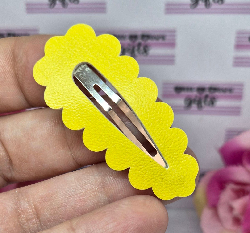 Yellow leatherette snap clip