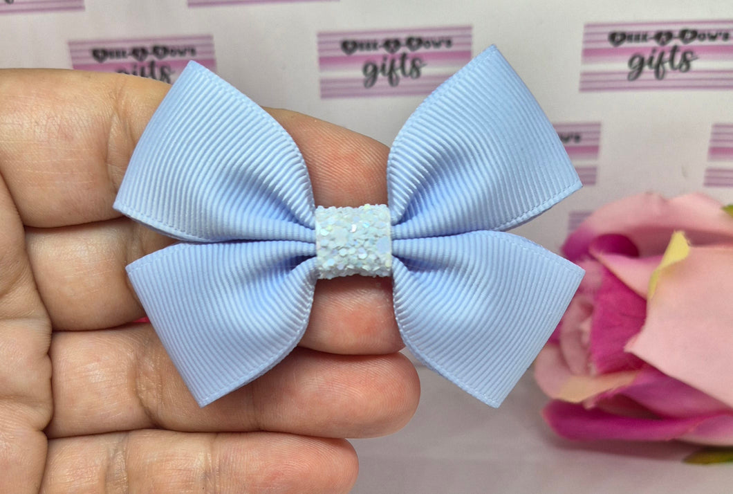 Small light blue ribbon bow