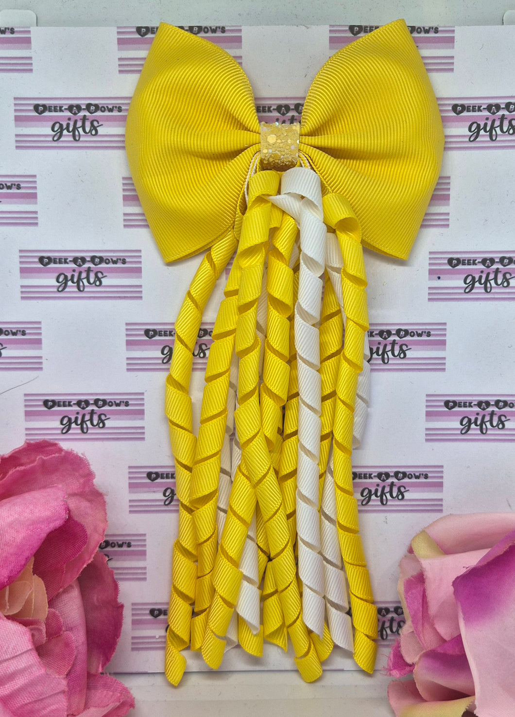 Yellow and white korker bow