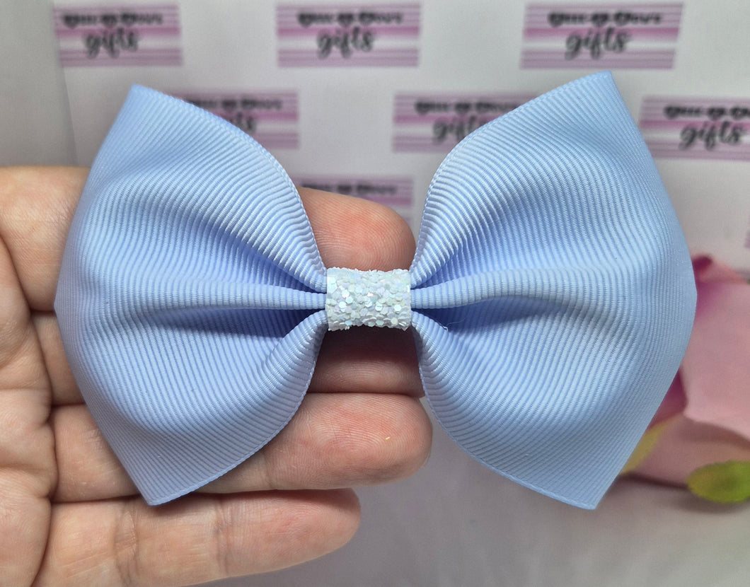 Large light blue ribbon bow