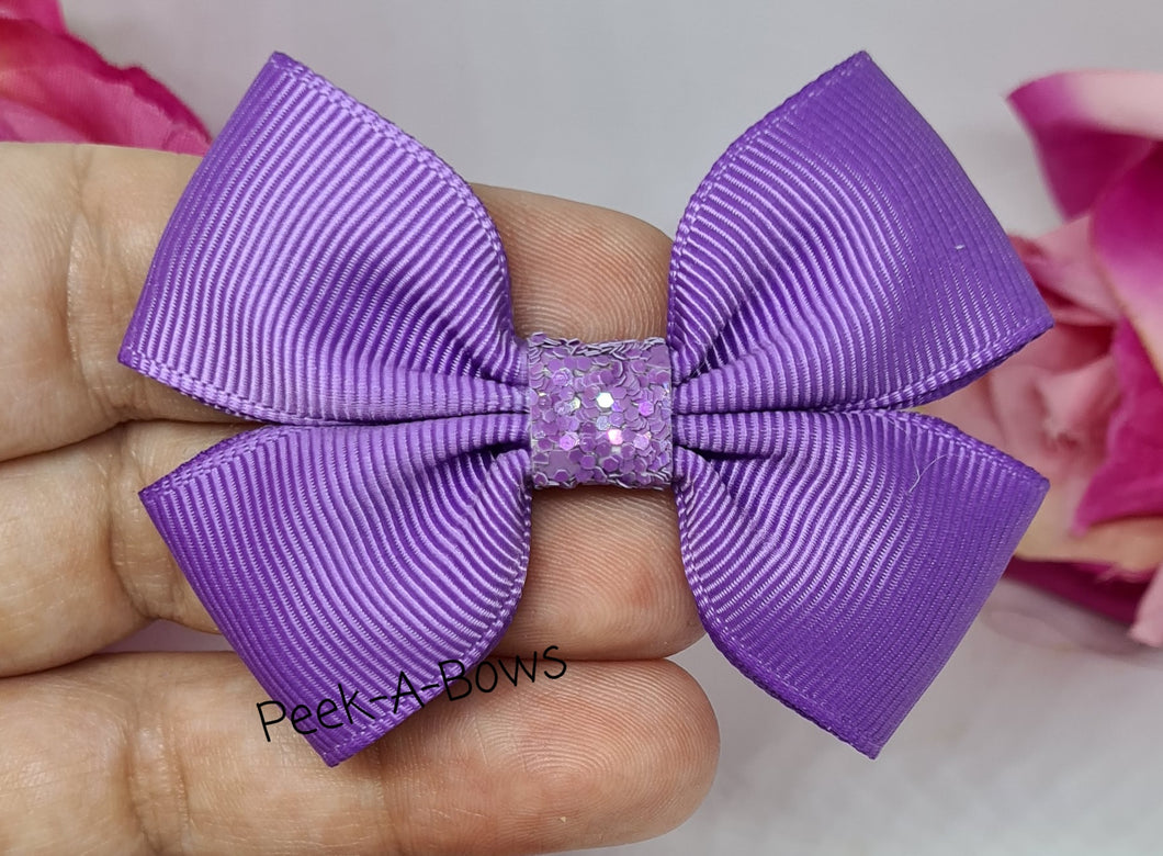 Purple ribbon tux bow