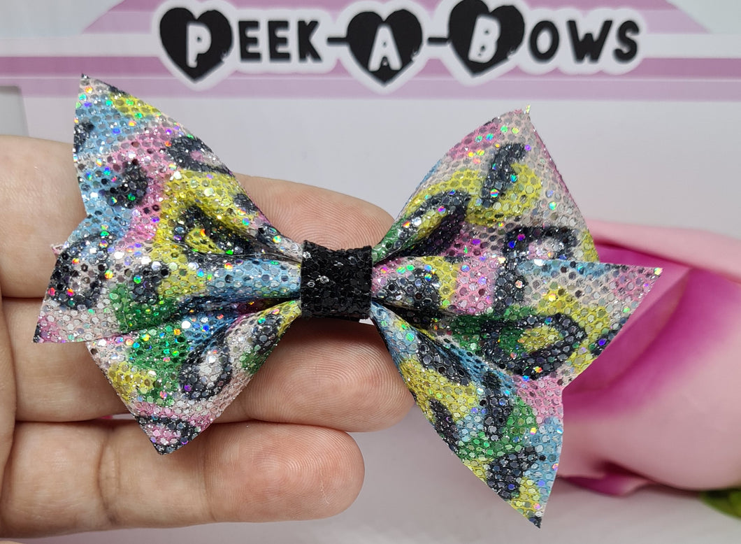 Rainbow leopard garnet bow