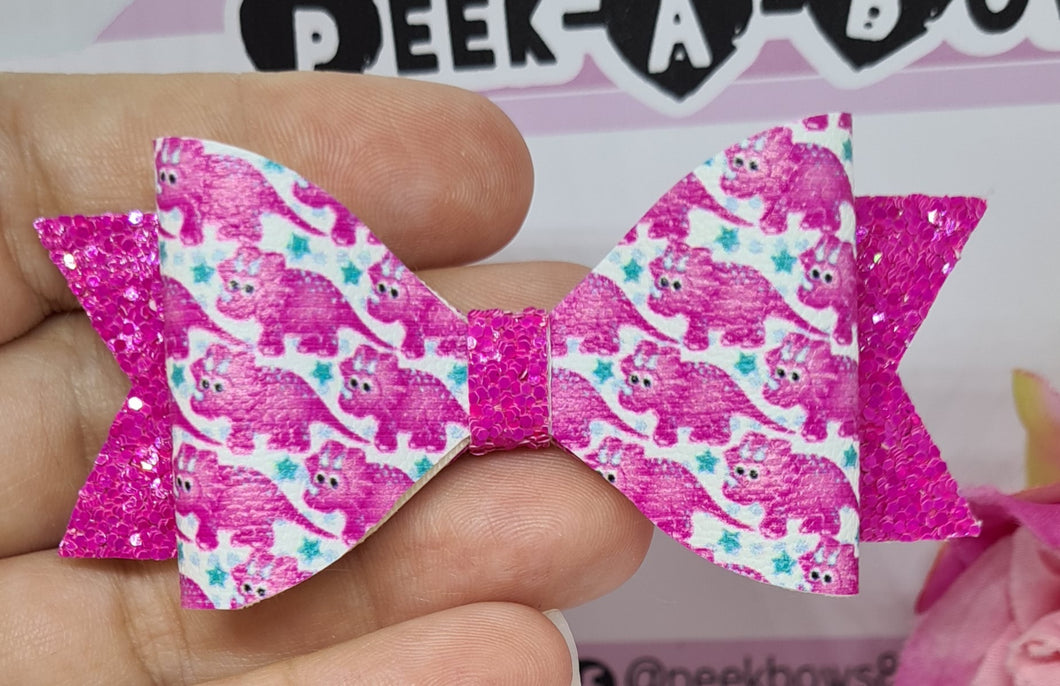 Hot pink dino bow – PEEK-A-BOW'S GIFTS