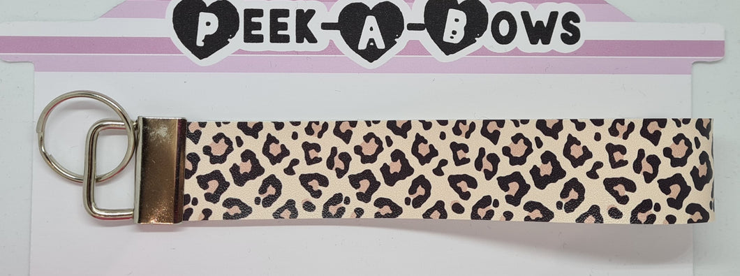 Blush leopard print wristlet