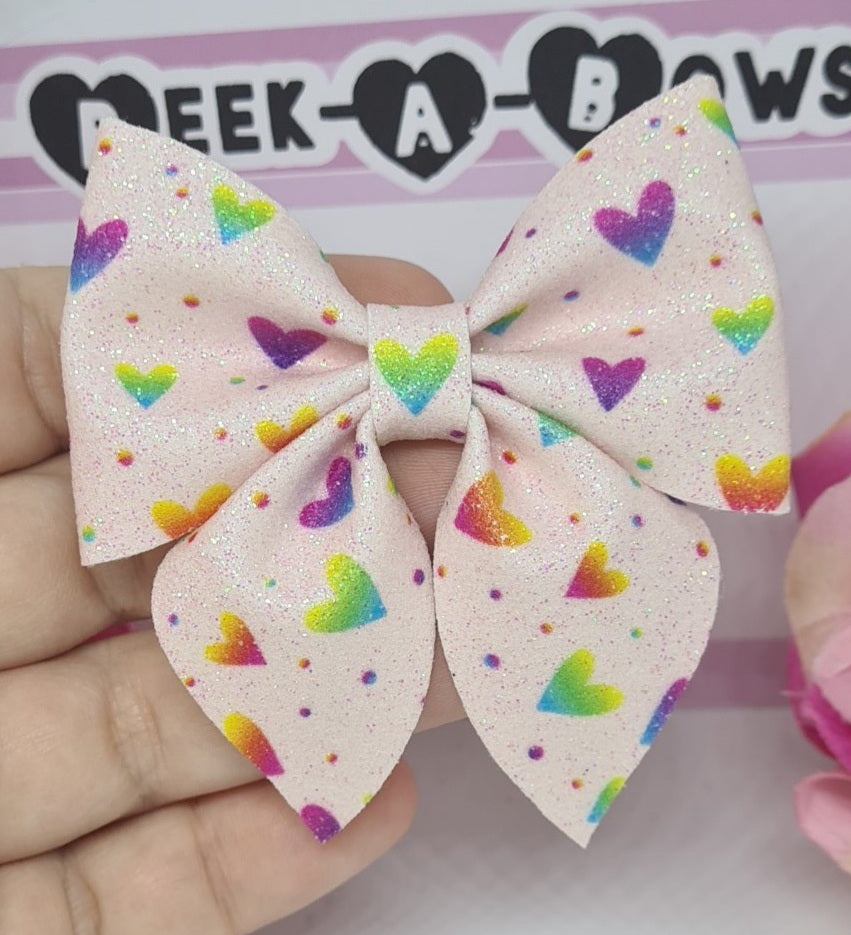 Pink rainbow hearts party pinch bow