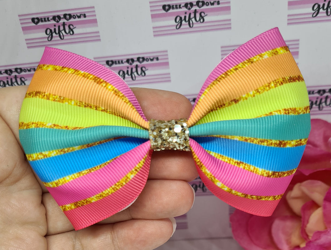 Rainbow glitter effect ribbon bow.