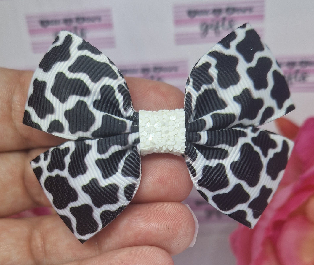 Busy cow print ribbon bows