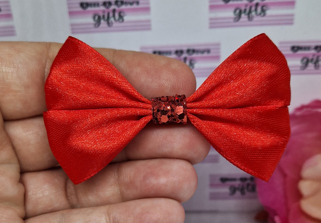 Red satin ribbon bow