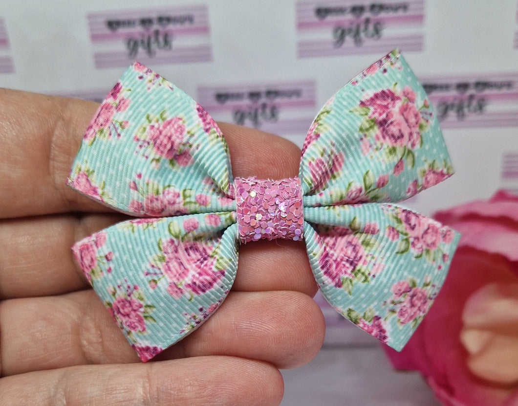 Blue and pink floral ribbon bow