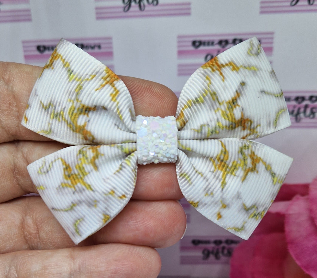 White marble ribbon bow