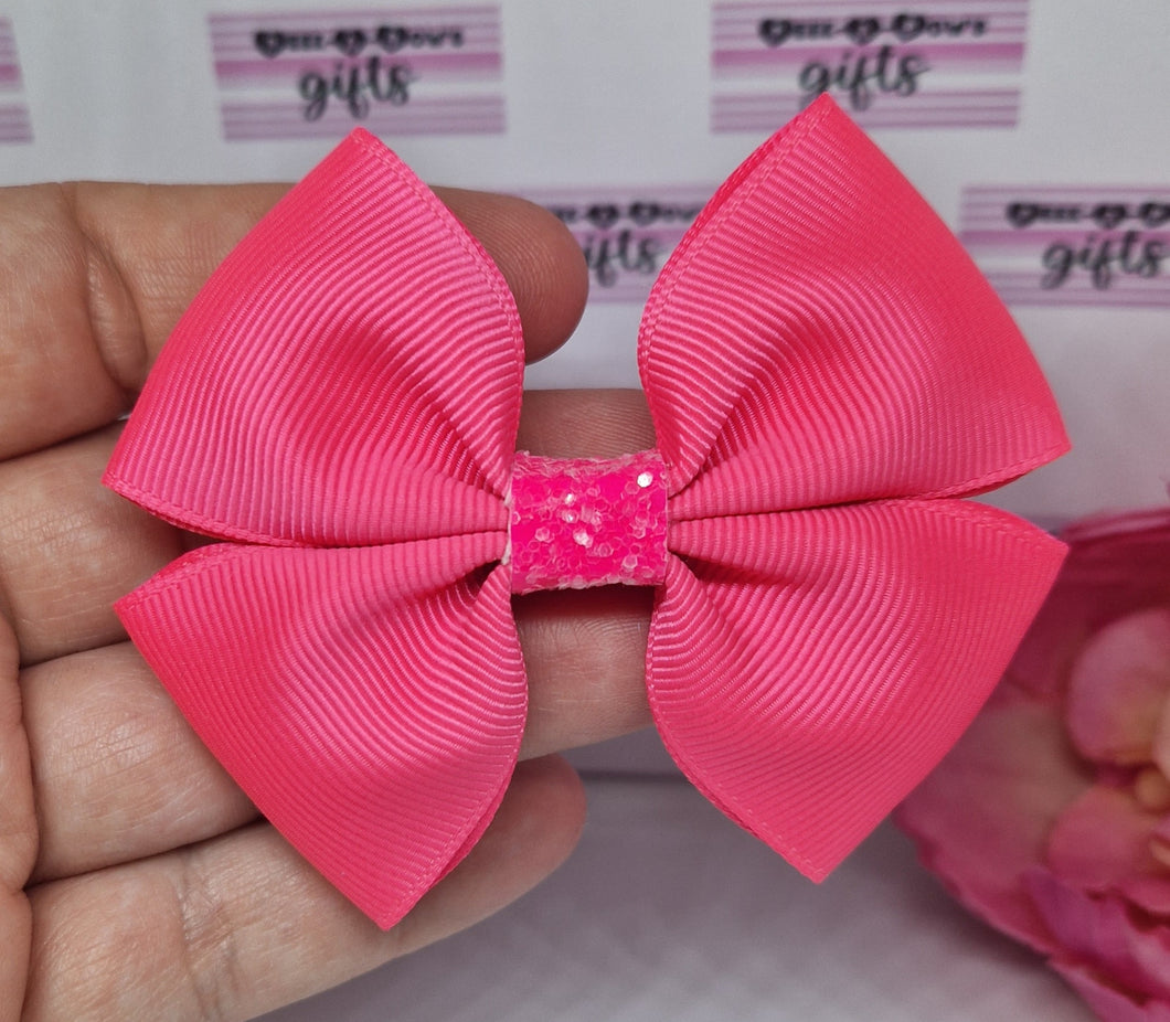 Medium neon pink ribbon bow