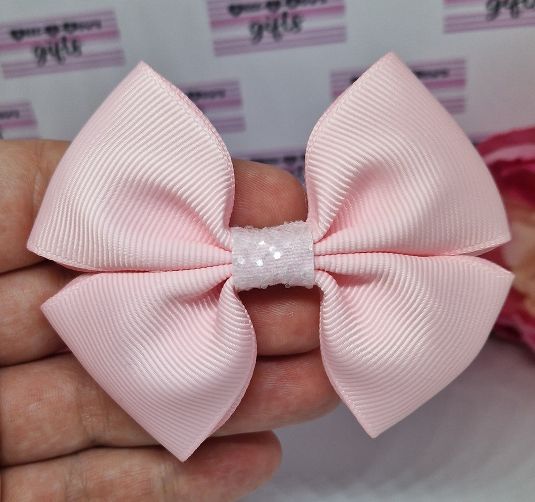 Medium baby pink ribbon bow