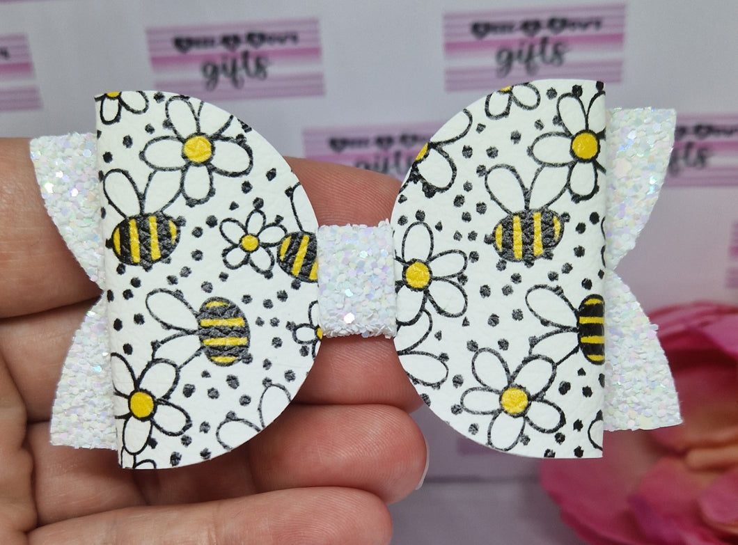 Bees and daisies bow