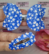 Load image into Gallery viewer, Blue forget me nots bow and snap clips
