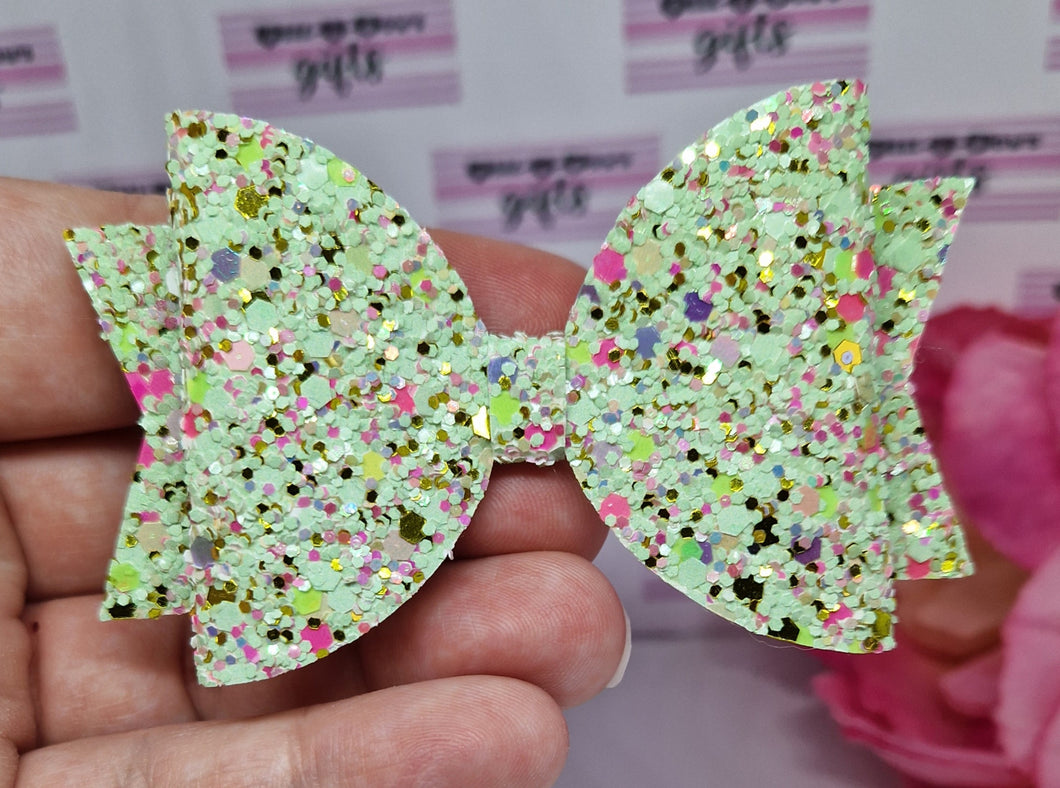 Mint sparkles bow and snap clips