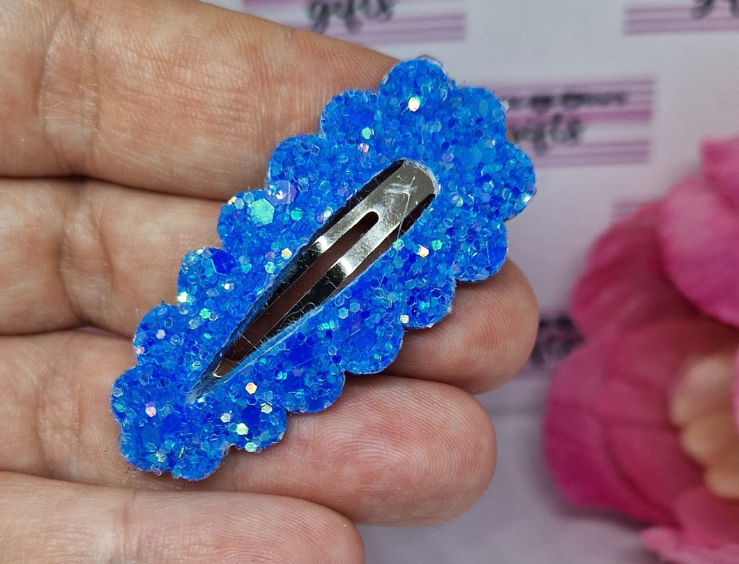 Neon blue glitter fringe clip