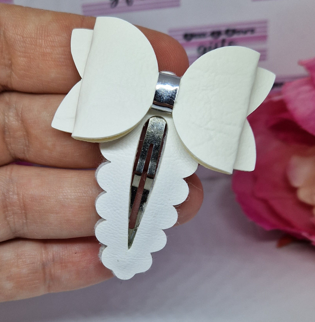 White leatherette fringe clip bow