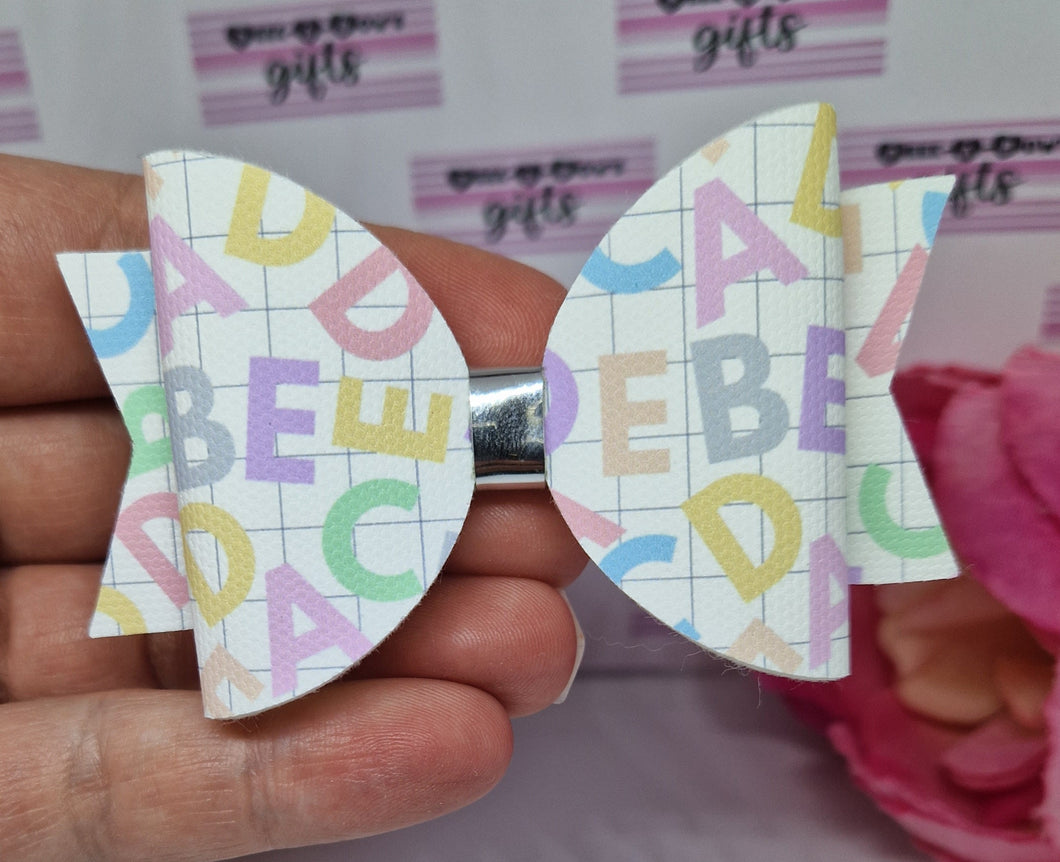 Pastel rainbow alphabet bow