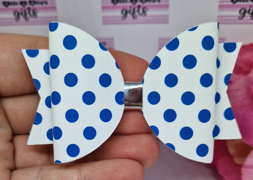 Navy and white spotty bow