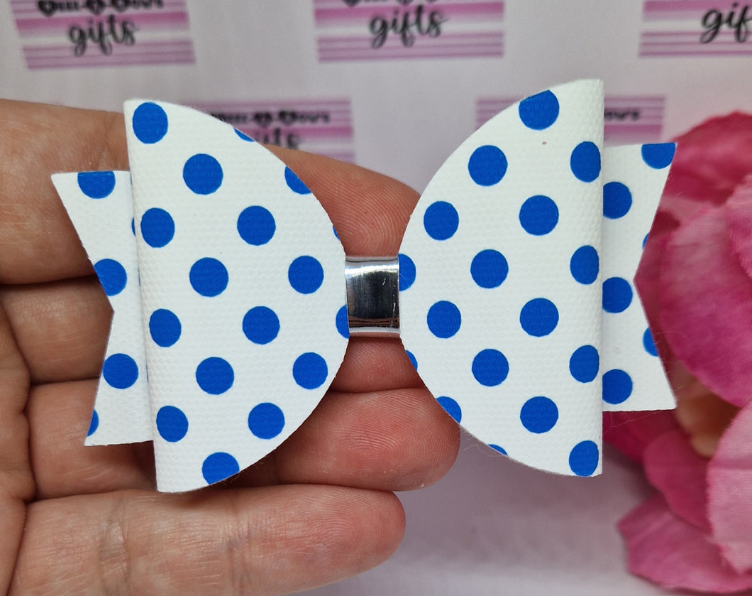 Royal blue and white spotty bow